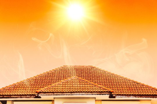 Summer Heat and AC Bills: How Attic Insulation Works Year-Round